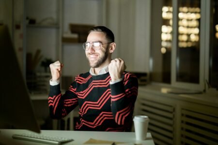 Excited gamer winning money via online casino